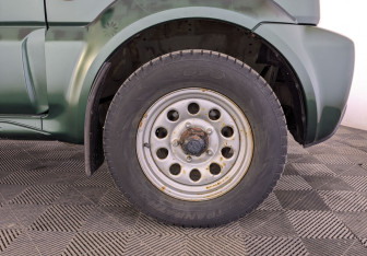 Подержанный автомобиль Suzuki Jimny 2011 года (12 фото)