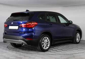 Подержанный автомобиль BMW X1 2018 года (2 фото)