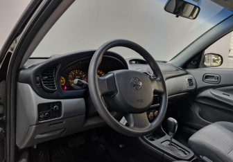 Подержанный автомобиль Nissan Almera Classic 2012 года (15 фото)