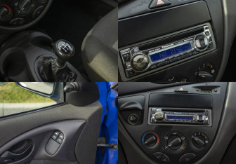 Подержанный автомобиль Ford Focus Hatchback 2003 года (14 фото)