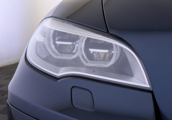 Подержанный автомобиль BMW X6 2013 года (17 фото)