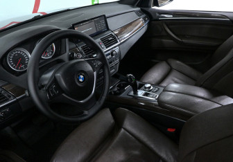 Подержанный автомобиль BMW X5 2009 года (7 фото)