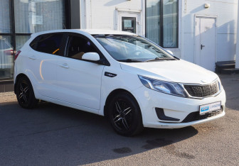 Подержанный автомобиль Kia Rio Hatchback 2013 года (3 фото)