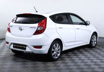 Подержанный автомобиль Hyundai Solaris Hatchback 2012 года (3 фото)