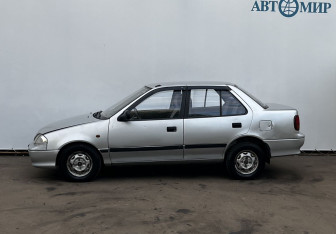 Подержанный автомобиль Suzuki Swift Sedan 2002 года (8 фото)