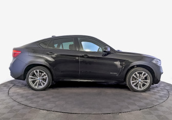 Подержанный автомобиль BMW X6 2018 года (4 фото)