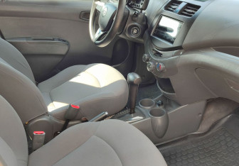 Подержанный автомобиль Chevrolet Spark 2012 года (9 фото)