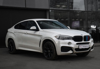 Подержанный автомобиль BMW X6 2016 года (3 фото)