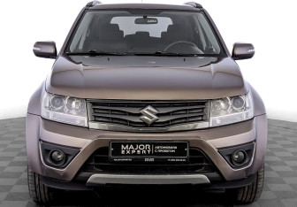 Подержанный автомобиль Suzuki Grand Vitara 2014 года (2 фото)