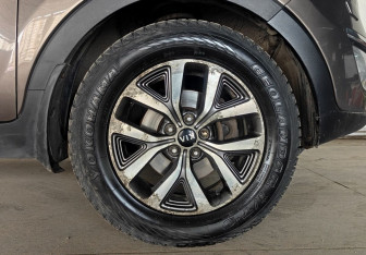 Подержанный автомобиль Kia Sportage 2014 года (18 фото)