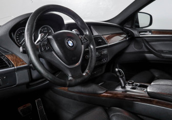 Подержанный автомобиль BMW X6 2010 года (14 фото)