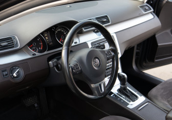 Подержанный автомобиль Volkswagen Passat Sedan 2011 года (10 фото)