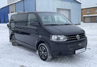 Подержанный автомобиль Volkswagen Caravelle 2013 года (3 фото)