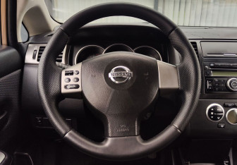 Подержанный автомобиль Nissan Tiida Sedan 2008 года (14 фото)
