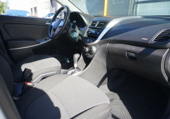 Подержанный автомобиль Hyundai Solaris Sedan 2013 года (11 фото)