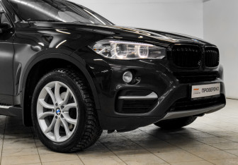 Подержанный автомобиль BMW X6 2015 года (25 фото)