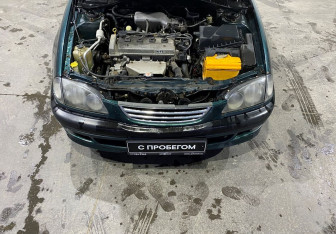 Подержанный автомобиль Toyota Avensis Sedan 1999 года (14 фото)