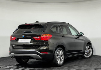 Подержанный автомобиль BMW X1 2018 года (2 фото)
