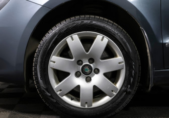 Подержанный автомобиль Skoda Superb Liftback 2014 года (18 фото)