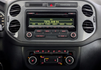 Подержанный автомобиль Volkswagen Tiguan 2013 года (15 фото)