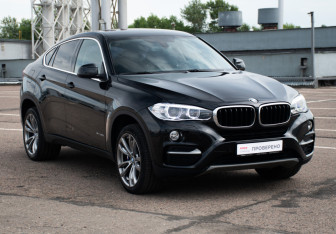 Подержанный автомобиль BMW X6 2015 года (3 фото)