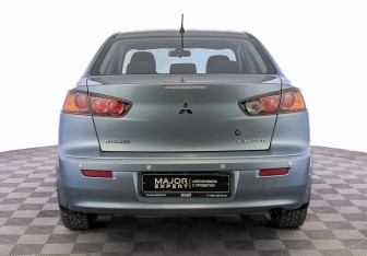 Подержанный автомобиль Mitsubishi Lancer Sedan 2011 года (6 фото)