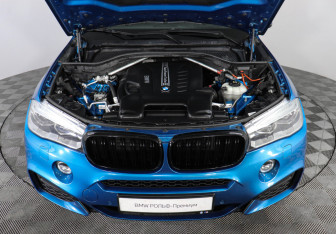 Подержанный автомобиль BMW X6 2018 года (10 фото)