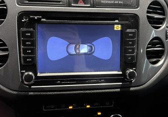 Подержанный автомобиль Volkswagen Tiguan 2013 года (12 фото)