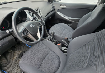 Подержанный автомобиль Hyundai Solaris Hatchback 2014 года (9 фото)