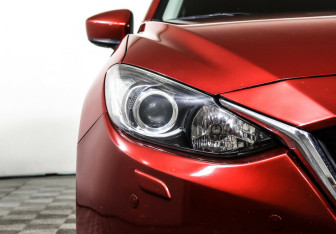 Подержанный автомобиль Mazda 3 Hatchback 2014 года (6 фото)