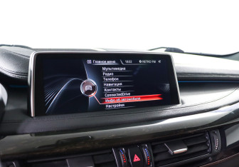 Подержанный автомобиль BMW X6 2015 года (17 фото)