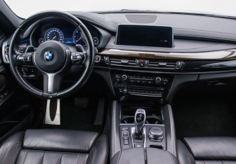 Подержанный автомобиль BMW X6 2018 года (13 фото)
