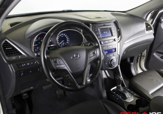 Подержанный автомобиль Hyundai Santa Fe 2015 года (9 фото)
