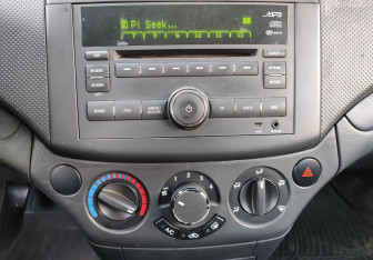 Подержанный автомобиль Chevrolet Aveo Hatchback 2010 года (13 фото)