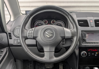 Подержанный автомобиль Suzuki SX4 Hatchback 2011 года (22 фото)