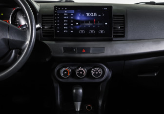 Подержанный автомобиль Mitsubishi Lancer Sedan 2012 года (13 фото)