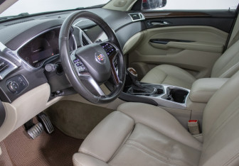 Подержанный автомобиль Cadillac SRX 2013 года (10 фото)