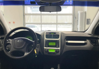 Подержанный автомобиль Kia Sportage 2010 года (11 фото)
