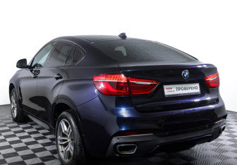 Подержанный автомобиль BMW X6 2016 года (7 фото)