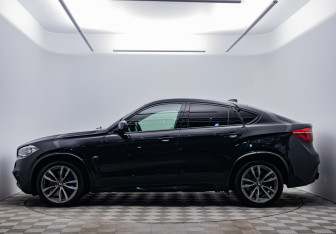 Подержанный автомобиль BMW X6 2014 года (2 фото)