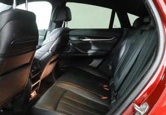 Подержанный автомобиль BMW X6 2014 года (10 фото)