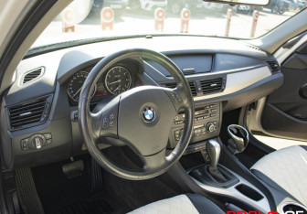 Подержанный автомобиль BMW X1 2014 года (9 фото)