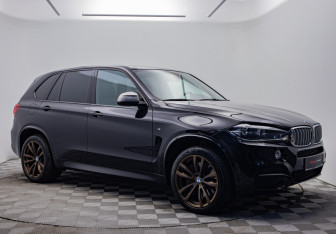 Подержанный автомобиль BMW X5 2016 года (7 фото)