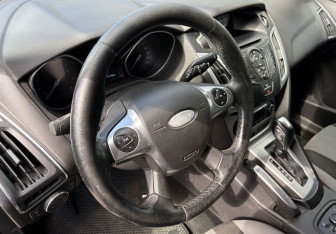 Подержанный автомобиль Ford Focus Hatchback 2013 года (14 фото)