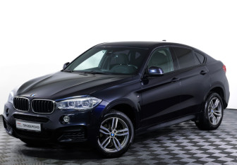 Подержанный автомобиль BMW X6 2016 года (23 фото)