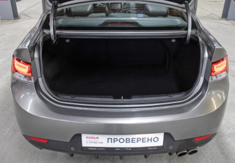 Подержанный автомобиль Kia Cerato Coupe 2012 года (10 фото)