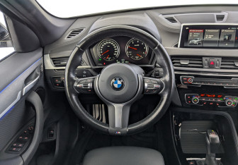 Подержанный автомобиль BMW X1 2021 года (21 фото)