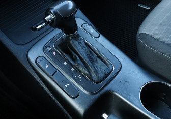 Подержанный автомобиль Kia Cerato Coupe 2013 года (15 фото)