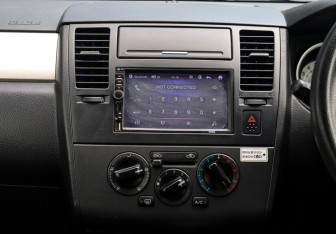 Подержанный автомобиль Nissan Tiida Hatchback 2010 года (13 фото)