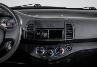 Подержанный автомобиль Nissan Micra Hatchback 2009 года (12 фото)